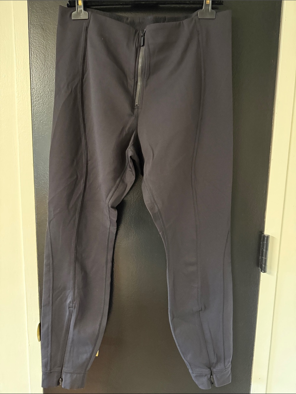 Lululemon Pull-On Zip-Front High-Rise Pants front pintucks and zippered cuffs.